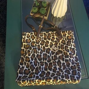 Michael Kors cheetah print bag.